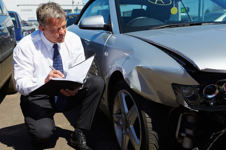 how do adjusters determine who is at fault