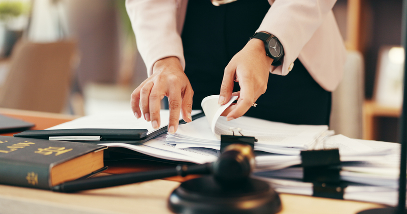 Lawyer sorting through documents - what to expect from a personal injury lawyer